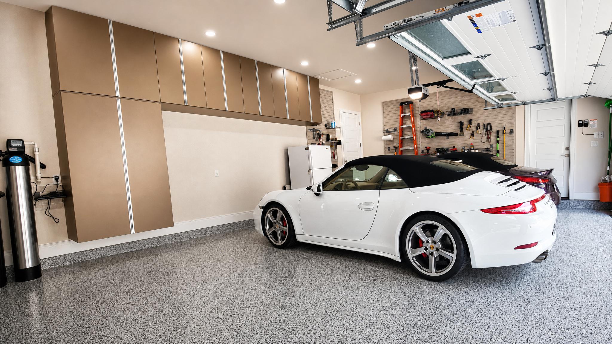 Luxury custom garage transformation with Porsche